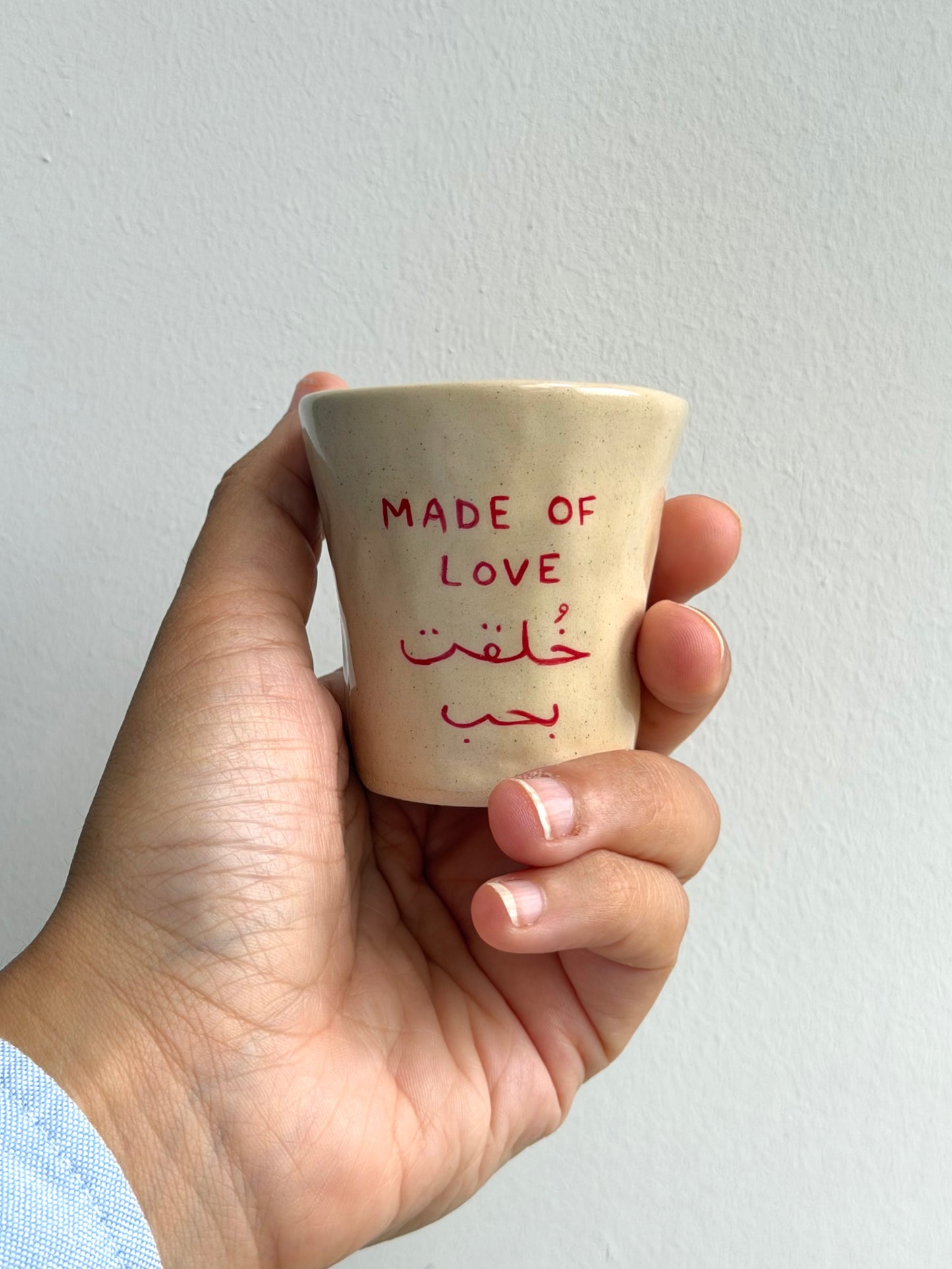Dual made of love cup in Arabic and English
