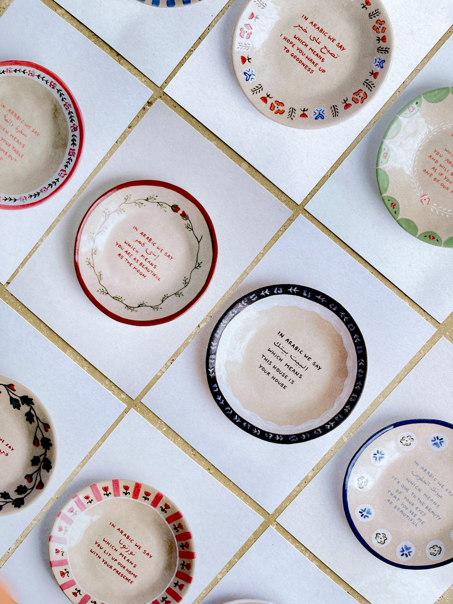 in Arabic we say plates / set of 10 postcards