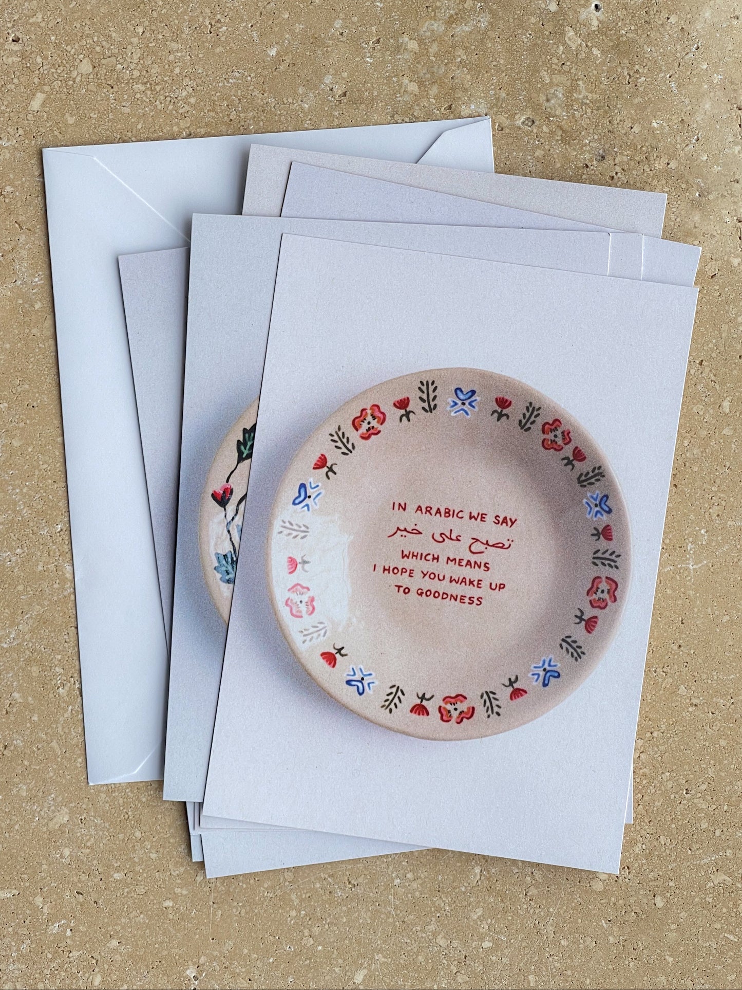 in Arabic we say plates / set of 10 postcards