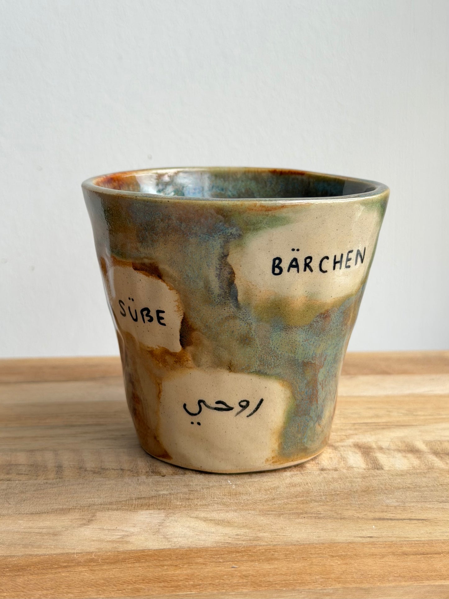 TOGETHER: German and Arabic