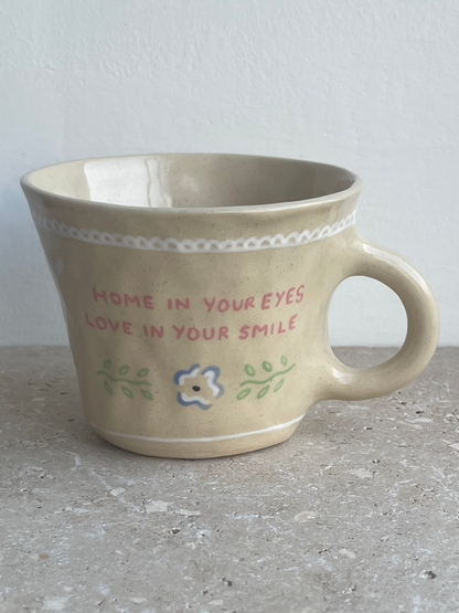 Home in your eyes, love in your smile mug