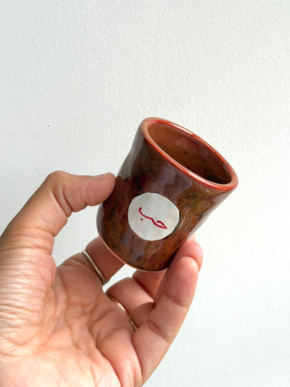 Espresso cup glaze test (Arabic word for love) 6