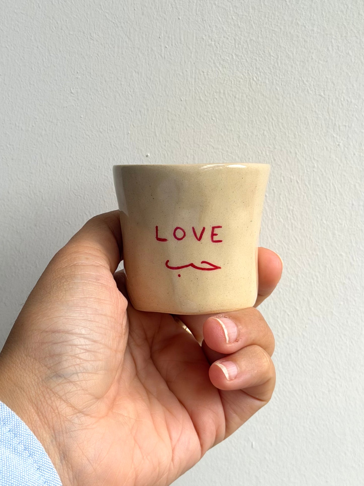 Dual love cup in Arabic and English