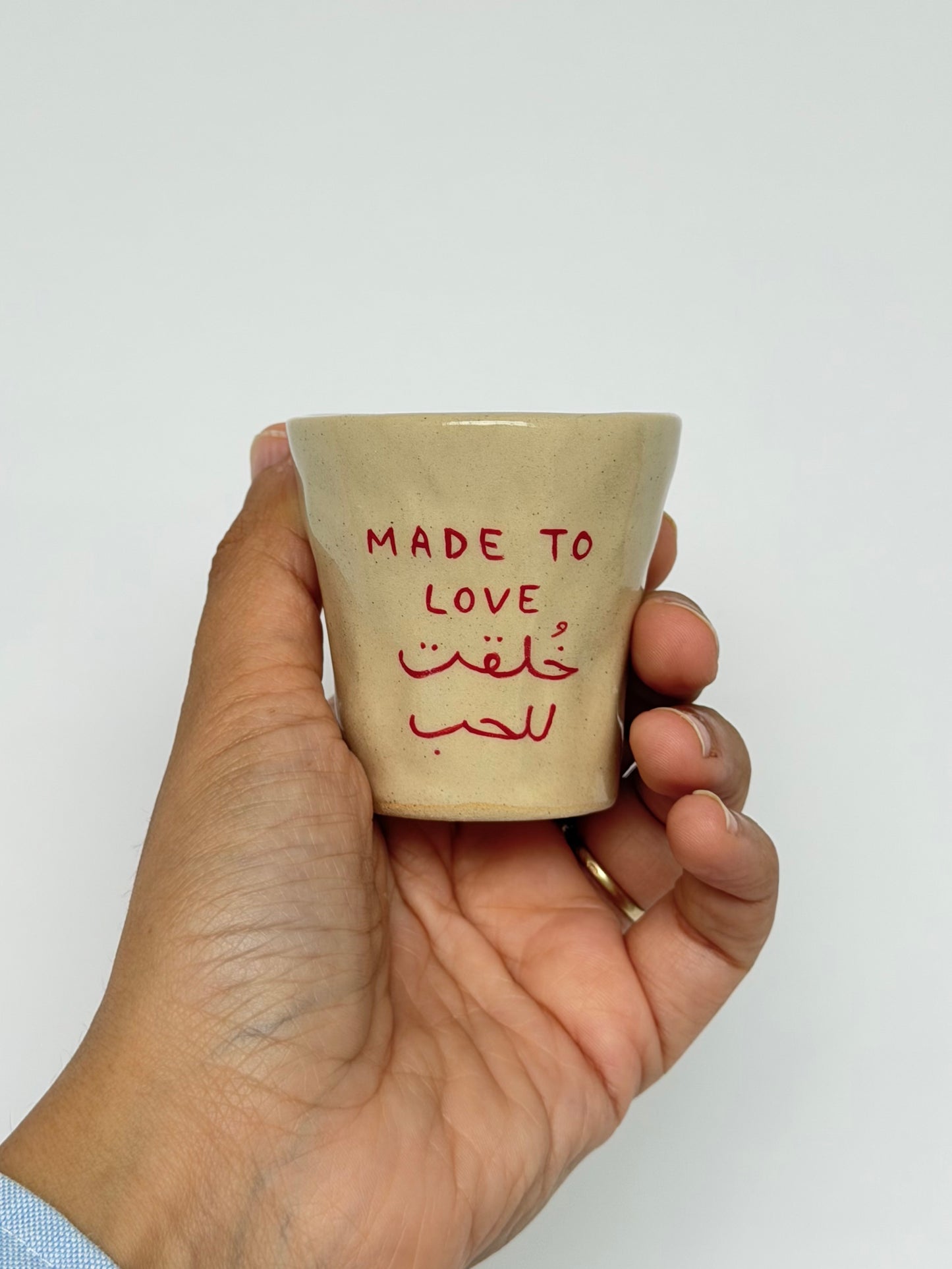 Dual made to love cup in Arabic and English